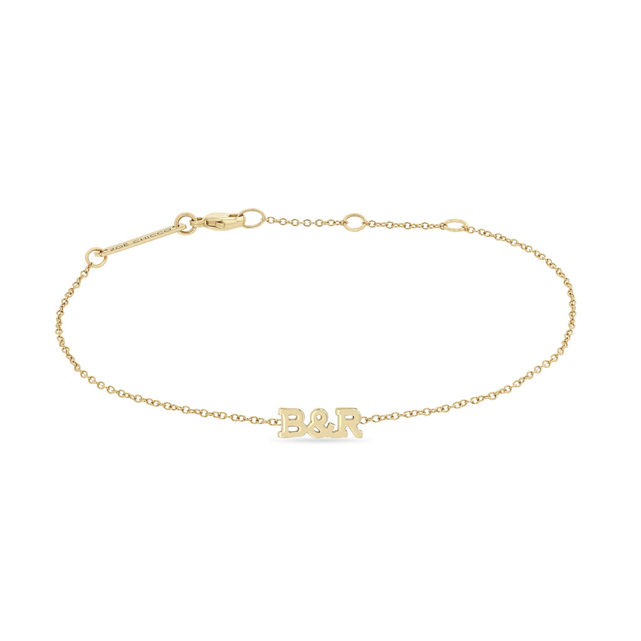 Zoe Chicco 14k gold itty bitty initial bracelet showing 'B & R' on a white background