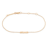 Zoë Chicco 14k Gold Custom Itty Bitty Letters Bracelet with the name NOAH