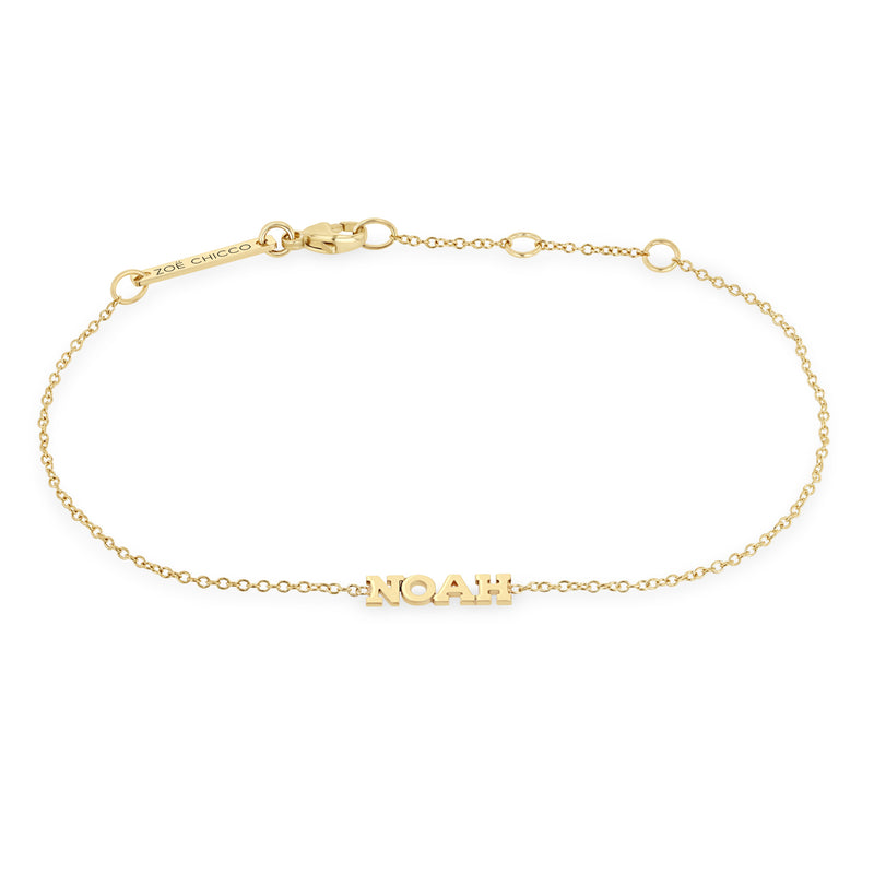 Zoë Chicco 14k Gold Custom Itty Bitty Letters Bracelet with the name NOAH