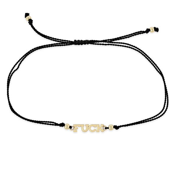 black cord bracelet with 14k gold in the center