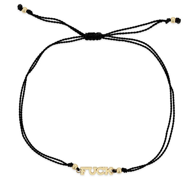 black cord bracelet with 14k gold in the center