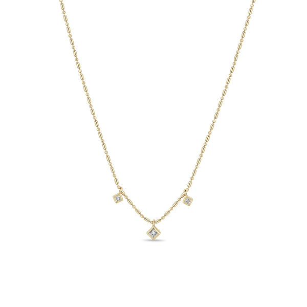 Zoe Chicco 14k gold bead chain necklace with three square diamond pendants handing towards the center on a white background