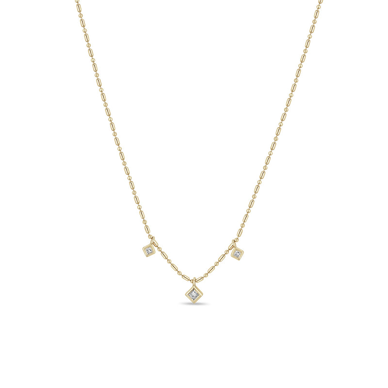Zoe Chicco 14k gold bead chain necklace with three square diamond pendants handing towards the center on a white background