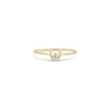 Zoe Chicco 14k gold small horseshoe ring with a small white diamond on a white background