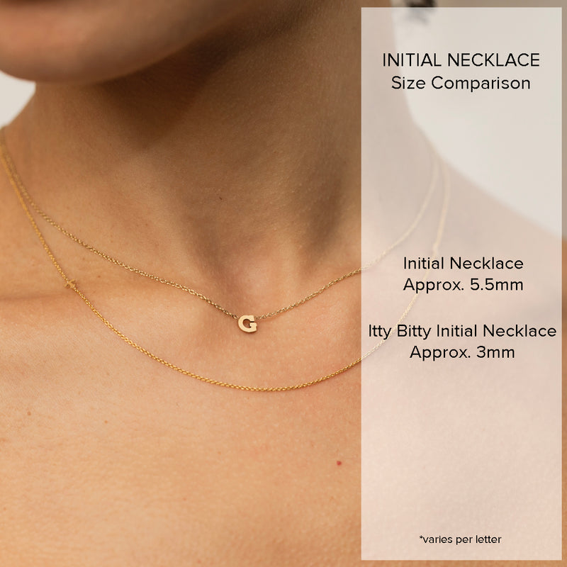 comparison image of woman wearing two different sizes of Zoe Chicco 14k gold initial letter necklaces