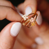 close up of woman holding four Zoe Chicco 14kt Gold Initial Rings
