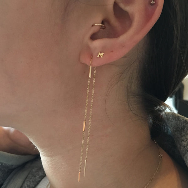 woman wearing Zoë Chicco 14kt Gold 3 Tiny Bars Threader Earrings