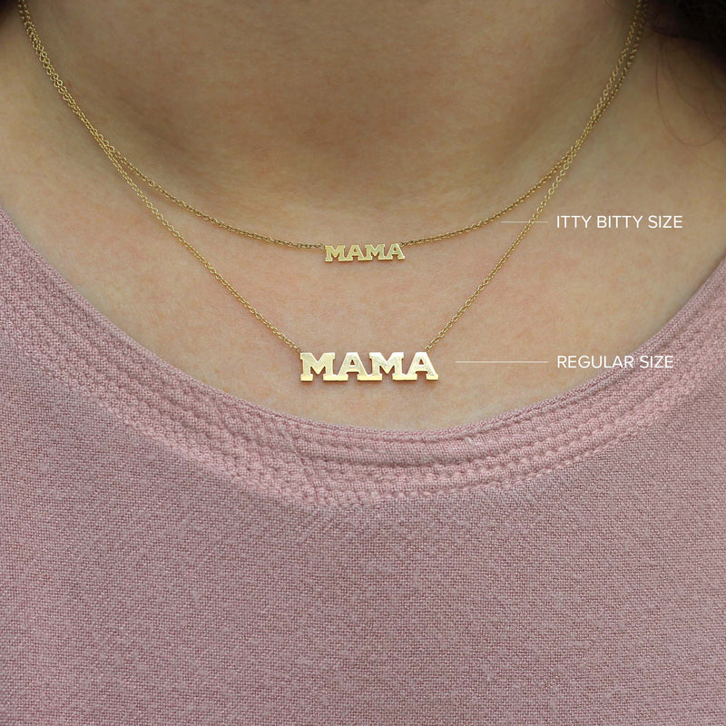 womans neck with Zoë Chicco 14kt Gold Itty Bitty MAMA Necklace