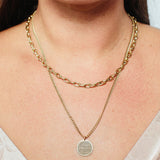 close up of woman's neck wearing Zoe Chicco 14kt Gold Medium Mantra Extra Small Curb Chain Necklace 