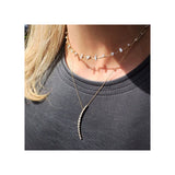 woman in black top wearing a Zoë Chicco 14k Gold Paris Mixed Diamond Collar Statement Necklace