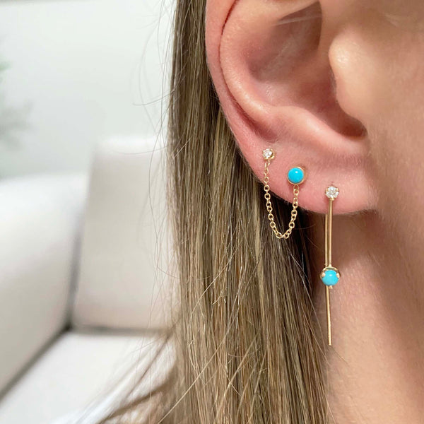 woman's ear wearing Zoë Chicco 14kt Gold Turquoise & Diamond Chain Double Stud Earring