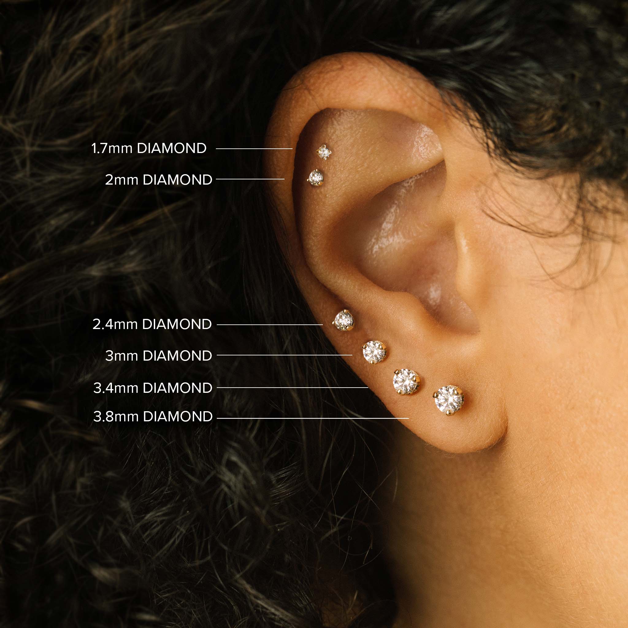 comparison image of Zoë Chicco 14k gold prong set round diamond solitaire stud earrings on a single ear