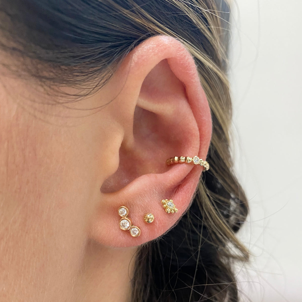 14k 3 Small Graduated Diamond Bezel Studs