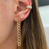 woman's ear wearing Zoë Chicco 14kt Large Curb Chain Link Drop Earrings with a Diamond Hexagon stud and a Pave Diamond Wide Ear Cuff