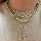 woman wearing a Zoë Chicco 14k Gold Medium Square Chain Necklace with Pavé Diamond Link