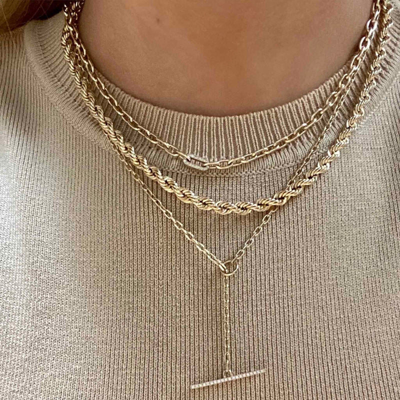 woman wearing a Zoë Chicco 14k Gold Medium Square Chain Necklace with Pavé Diamond Link