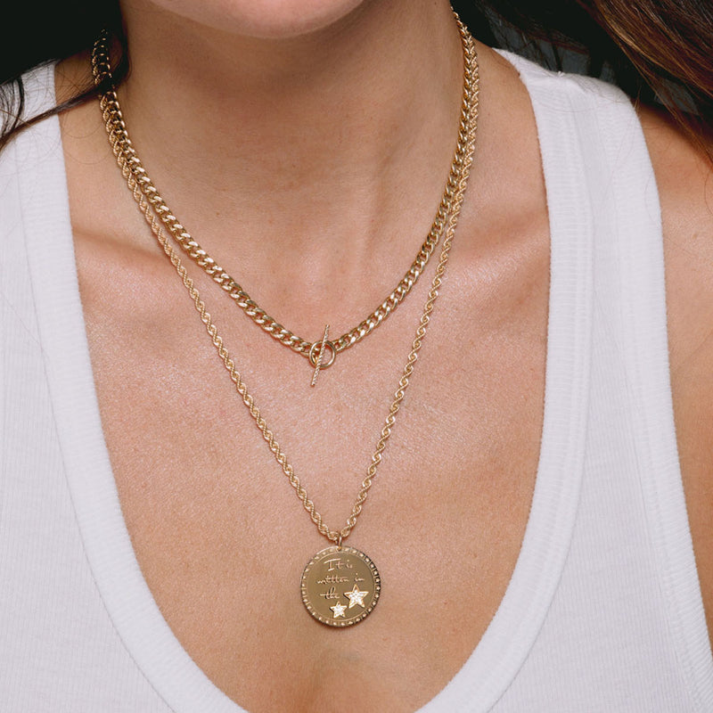 woman in white tank top wearing Zoë Chicco 14k Gold Medium Curb Chain Pavé Diamond Toggle Necklace around her neck