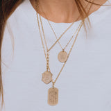 woman in white shirt wearing Zoë Chicco 14k Gold Engraved Diamond Mantra Shield Mixed Chain Lariat around her neck