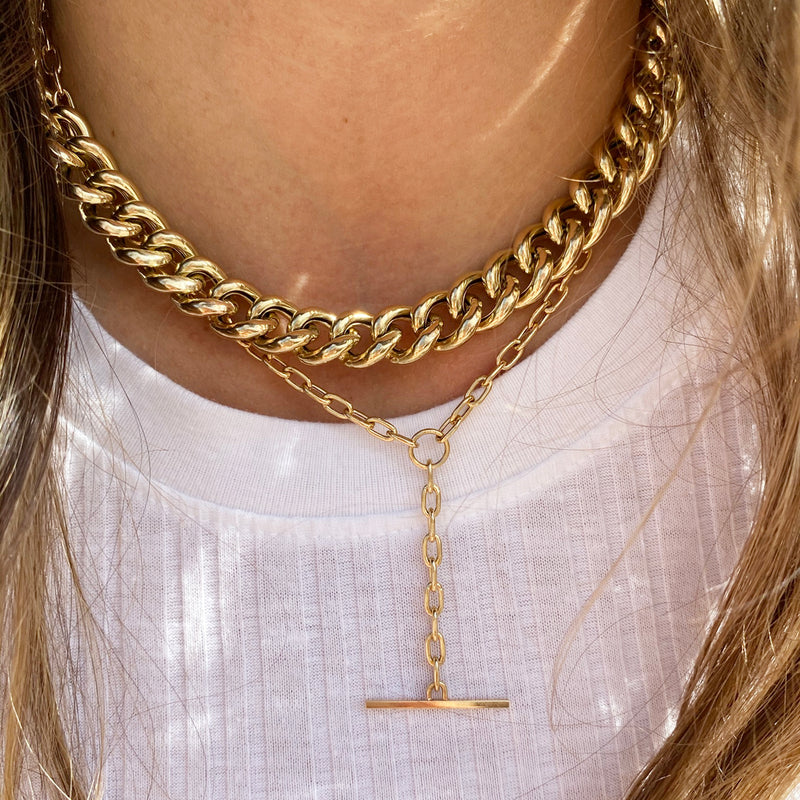 woman in white top wearing Zoë Chicco 14kt Gold Medium Square Oval Link Chain Faux Toggle Lariat
