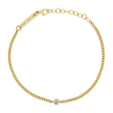 top down view of a Zoë Chicco 14k Gold Diamond Bezel Extra Small Curb Chain Bracelet