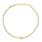 top down view of a Zoë Chicco 14k Gold Emerald Cut Diamond XS Curb Chain Bracelet