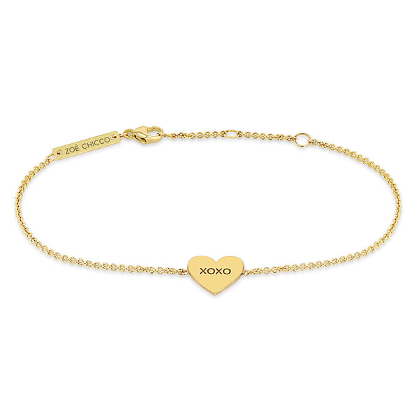 front view of Zoë Chicco 14k Gold Candy Heart Chain Bracelet engraved with XOXO