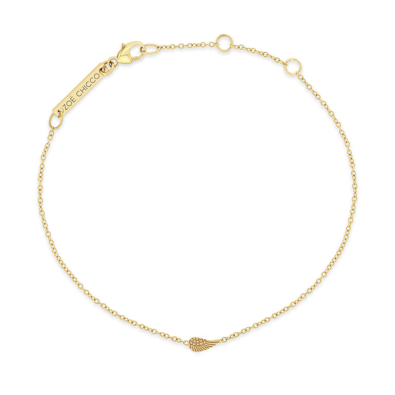 top down view of a Zoë Chicco 14k Gold Itty Bitty Angel Wing Bracelet