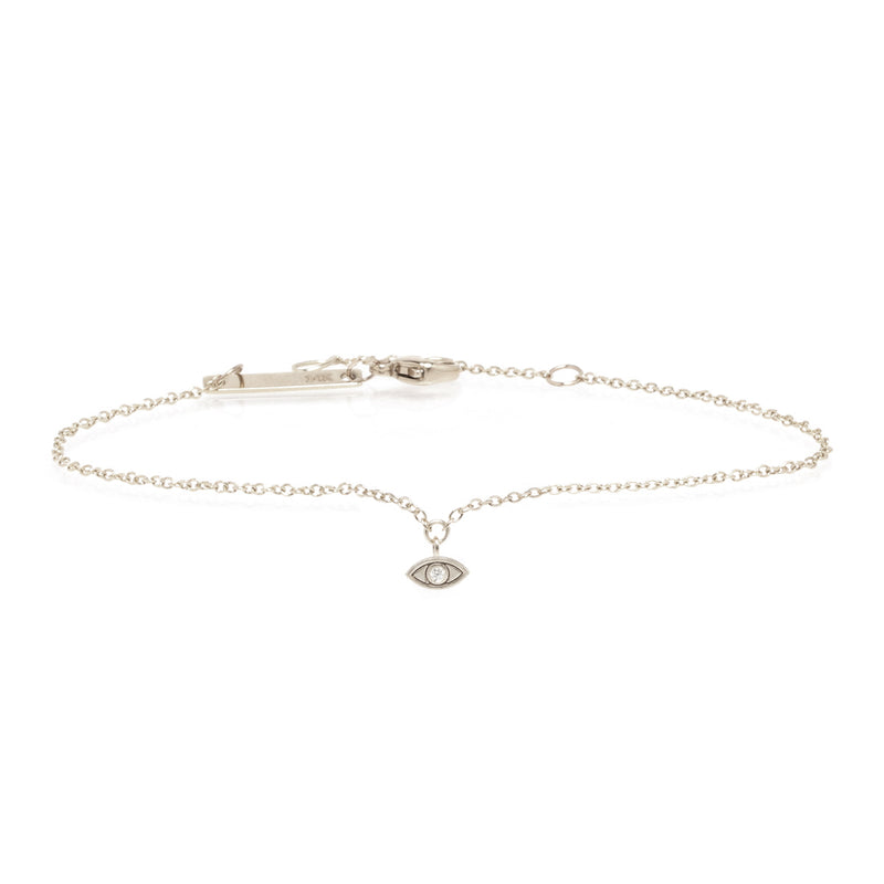 white gold evil eye chain bracelet with single diamond
