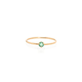 round green emerald ring