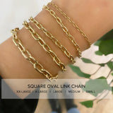 five different widths of Zoe Chicco 14kt gold square oval link chain bracelets on a wrist